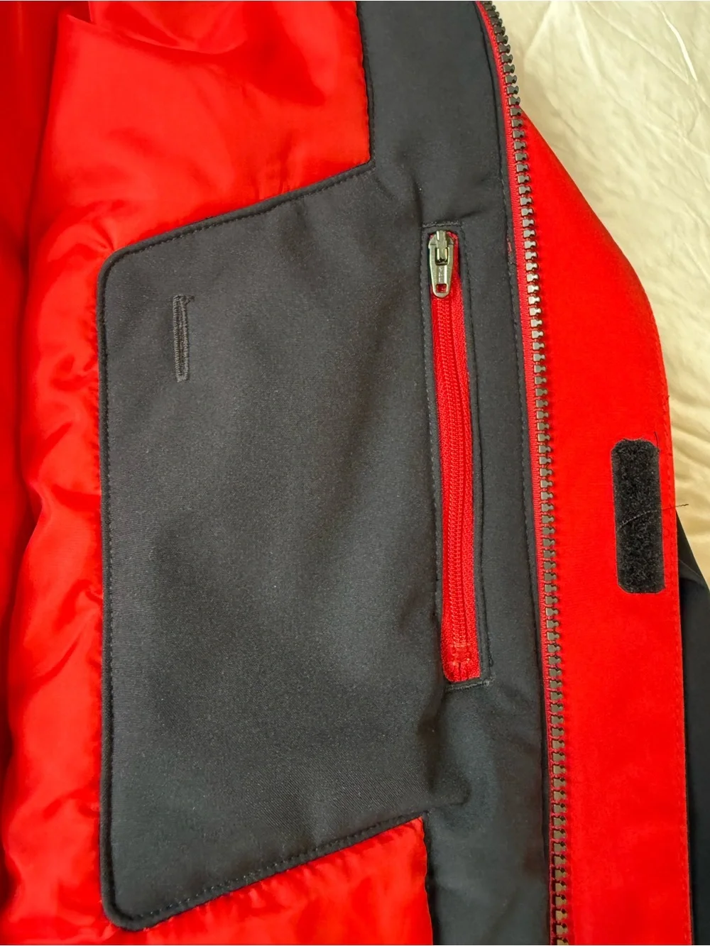 Obermeyer Boys' Axel Insulated Jacket in the colorway Brakelight (Red/Black)